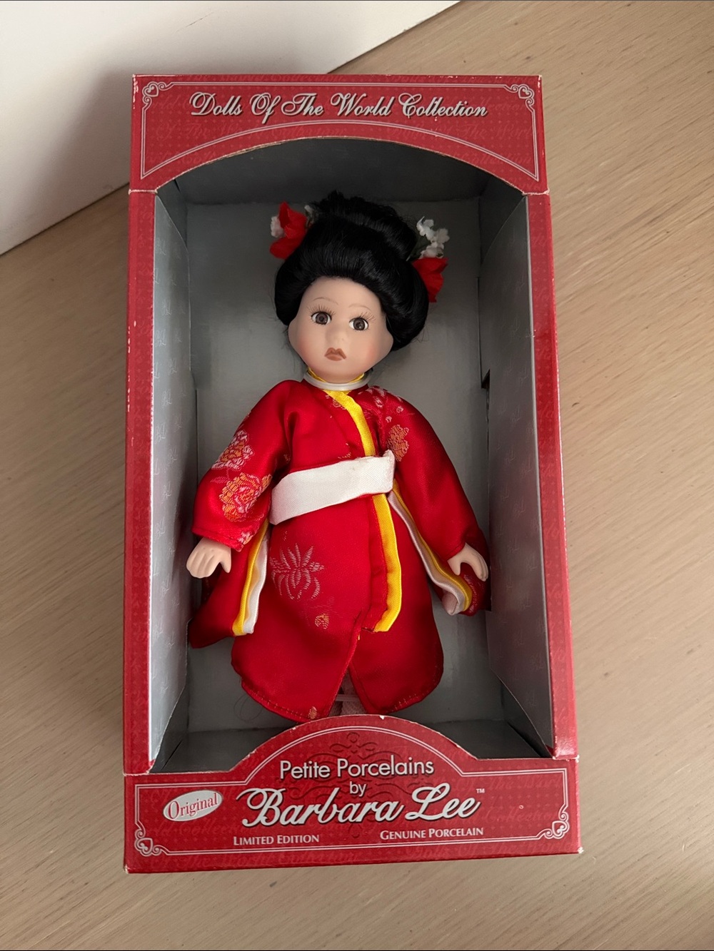 Petite Porcelain Doll in Red Traditional Outfit